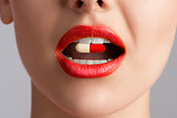 beauty female lips with pill 