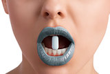 female blue lips with pill 