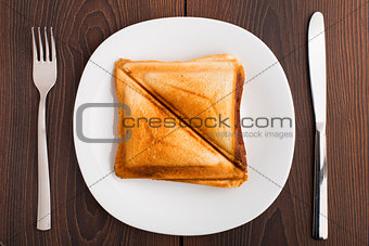 Grilled sandwich on plate