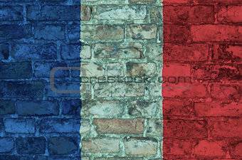 Flag of France on a brick background