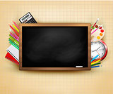 Back to school. Background with blackboard and school supplies. 