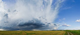 Panorama of the Beautiful Autumn Field under Stormy Sky