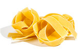 Raw pasta isolated on white 