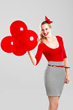 Woman with red ballons