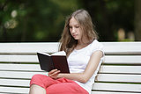 young girl reading book