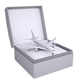 Airplane in open gift box