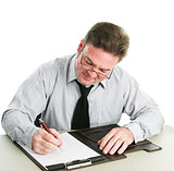 Businessman Writing on Legal Pad