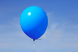 Inflatable balloon, photo on the against the blue sky