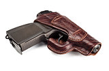 vintage pistol in leather holster