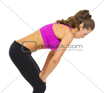 Portrait of tired fitness young woman