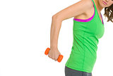 Closeup on fitness young woman making exercise with dumbbells