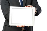 business man holds a tablet computer