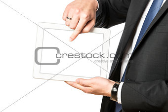 Business man shows something on his tablet computer