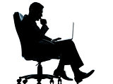 one business man computer computing serious sitting in armchair 
