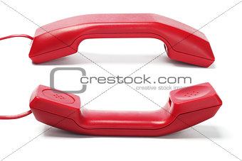 Two Red Telephone Handsets