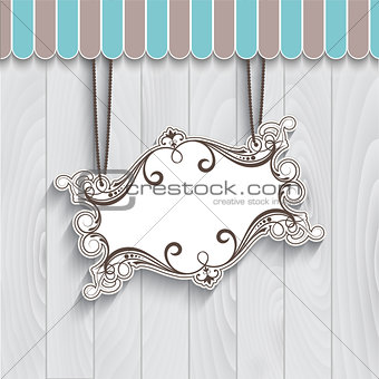 Decorative sign on wooden background
