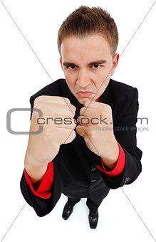 Angry businessman clenching his fists