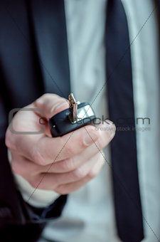 Holding a car key