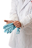 Doctor or Scientist putting on gloves
