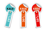 Sale sticker style sign with attached labels