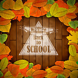 Back to school wood board with leaves