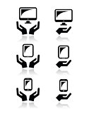 Hands with computer, tablet, mobile or cell phone icons