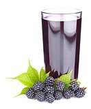 ripe blackberry with green leaves and fresh juice in glass