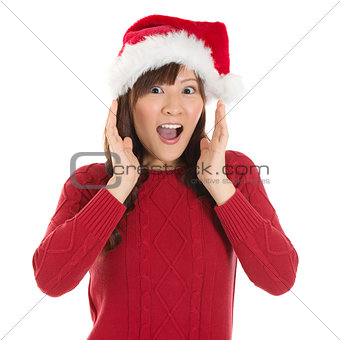 Shocked Asian Santa woman