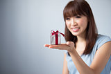 Asian Girl Holding Gift Box