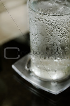 Glass of cool water with ice