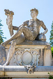 Allegoric stone male statue