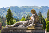 Antique woman statue on pedestal