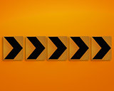 Orange direction sign
