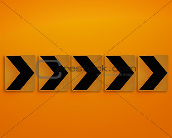 Orange direction sign