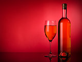 White wine on a red background
