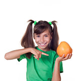 little girl with grapefruit