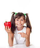 little girl with red pepper