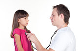male doctor examining little girl