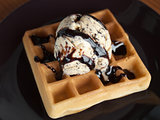 Vanilla ice cream with waffle topped with chocolate