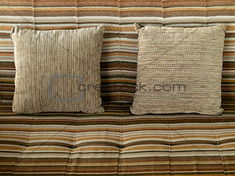 Pillow with brown fabric cover