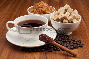 Cup of Coffee and Sugar Cinnamon Stick