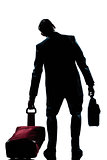 caucasian business traveler man tired with suitcase  