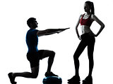 coach man woman exercising squats on bosu