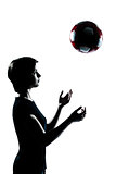 one young teenager   girl silhouette tossing soccer football