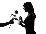  silhouette man hand offering a flower rose 