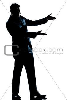 silhouette man full length showing pointing empty copy space