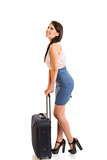 Smiling woman with travel luggage