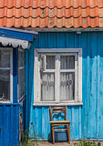 Window and chair of a house in Nida