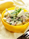 egg salad with quail eggs, cucumber and sausage