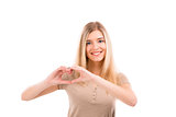 Woman doing a heart with her hands